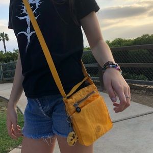 yellow kipling cross body purse brand new